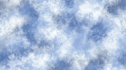 An image of a cloudy sky with a blend of light and dark blue colors. There are numerous white clouds, all different shapes and sizes