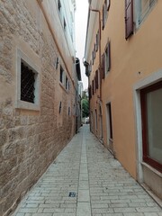 Fototapeta premium narrow street in the town