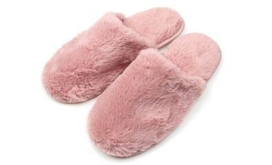 Soft fuzzy home slippers isolated on white background. Pink indoor footwear for women