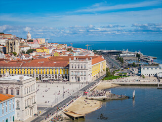 Obraz premium Aerial view of Praca do Comercio and Baixa district in Lisbon old town, Portugal. Panoramic drone photo of central square 