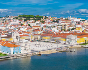 Aerial view of Praca do Comercio and Baixa district in Lisbon old town, Portugal. Panoramic drone photo of central square and Arco da Rua Augusta