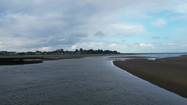 Beautiful High Angle Footage of Beach and Ocean Sea Side at Point Clear Village in Civil Parish of Saint Osyth, County of Essex, England, United Kingdom During Windy and Cloudy Day. May 22nd, 2024