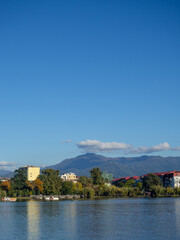 Fototapeta premium Lake in the mountainous area. Lake Nurigel in Batumi. Water surface, against the backdrop of the mountain.