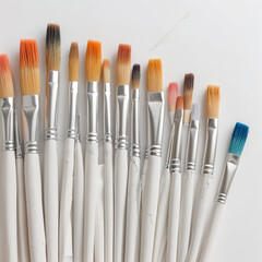 Fototapeta premium A set of paintbrushes and watercolor paints on a white background 4