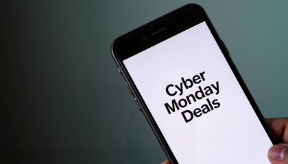 Fototapeta premium Smartphone displaying Cyber Monday deals text in a modern and minimalistic design