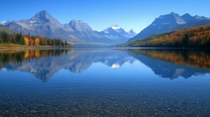 A serene lake with snow-capped mountains reflected in the crystal-clear water.