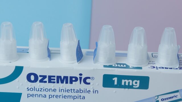 Qawra, Malta - 01.11.2024 - Ozempic box and extra needless on top of it. Close up on the needle. Diabetes and weight loss medication. High quality photo