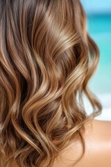 Naklejka premium A woman with long, wavy brown hair by the pool