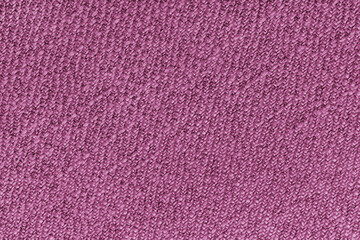 Pink Jacquard fabric with diagonal woven, coarse weave texture upholstery cloth. Textile background, furniture textile material, wallpaper, backdrop. Cloth structure close up, macro.