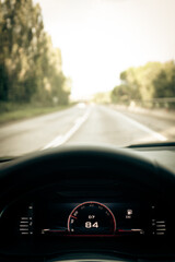 Digital speedometer and engine speed while driving in a highway driver point of view