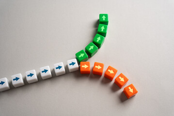 A fork dividing a path into two opposite directions. The concept of a decision point and division....