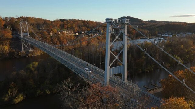 sunset flying clockwise around east side of Kingston Port Ewen Bridge