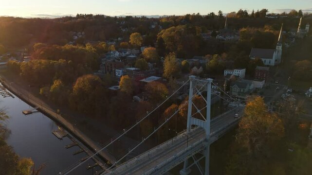 curving over Kingston Port Ewen Bridge towards sunset