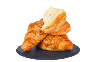 Crisp fresh croissants in the background