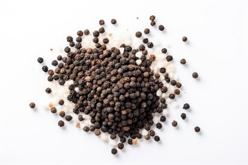 Black pepper and sea salt isolated on a white background seen from above