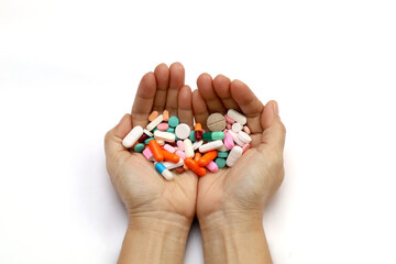 Dietary supplement or sick, asian young woman, girl hold pills, drugs medical tablet on hand pouring capsules from medication bottle, take vitamin for treatment for skin, hair at home, healthcare.