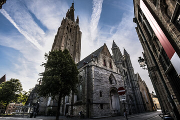 Fototapeta premium Church of Our Lady under Dramatic Skies - Bruges, Belgium