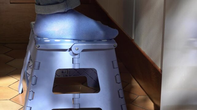 Folding plastic step stool for climbing to height