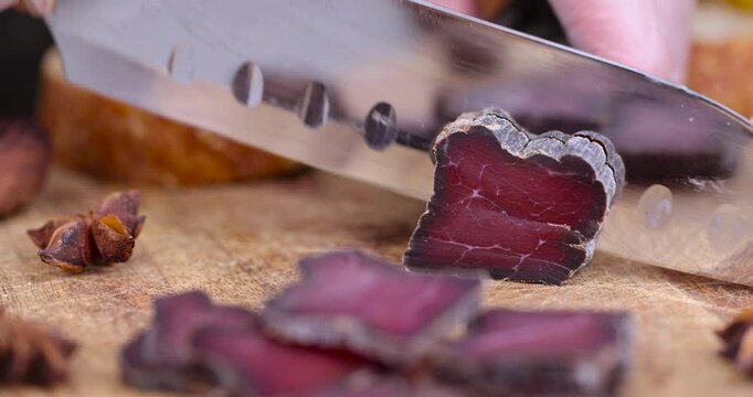 beef jerky cut into pieces on the table, salted beef sliced for serving