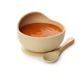 Delicious baby food in bowl and spoon isolated on white