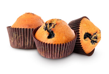Tasty blueberry muffins in cupcake liners isolated on white
