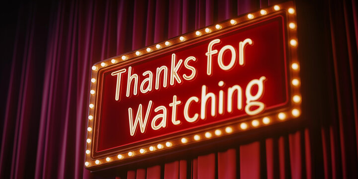 Thanks for watching neon sign with light bulbs on red curtain