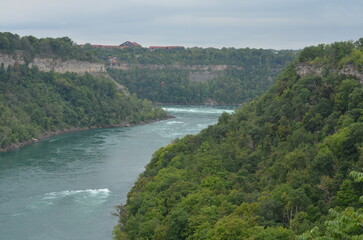 Obraz premium Stunning aerial view of canyon by Niagara Falls, Niagara River in Canada and New York. American Side, Canadian Side. Gorgeous nature, one of the seven wonders. 