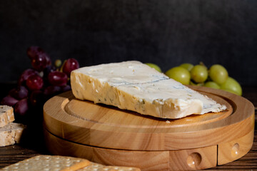 A big block of cheese that everyone likes to eat.