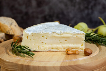 A big block of cheese that everyone likes to eat.