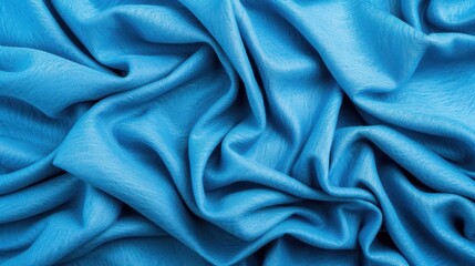 Fototapeta premium Soft, abstract blue fabric texture perfect for design projects or backgrounds. Ideal for adding a serene touch to your space.