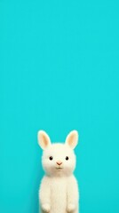 Obraz premium Cute White Rabbit on Turquoise Background Easter Animal Pet Adorable Soft Fluffy F