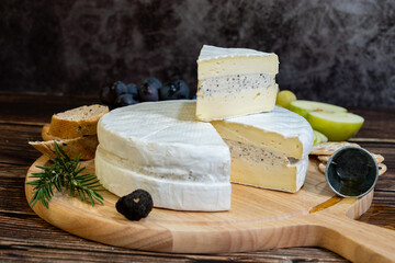 A big block of cheese that everyone likes to eat.