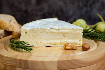 A big block of cheese that everyone likes to eat.