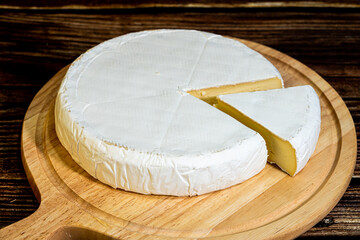 A big block of cheese that everyone likes to eat.