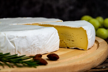 A big block of cheese that everyone likes to eat.