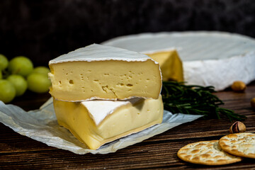 A big block of cheese that everyone likes to eat.