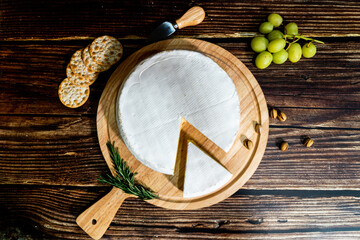 A big block of cheese that everyone likes to eat.