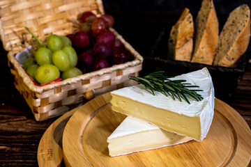 A big block of cheese that everyone likes to eat.