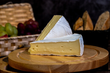 A big block of cheese that everyone likes to eat.