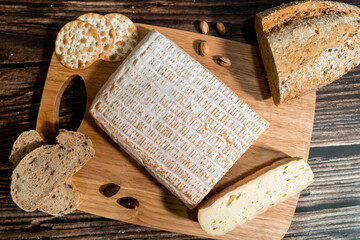 A big block of cheese that everyone likes to eat.