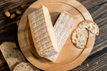 A big block of cheese that everyone likes to eat.