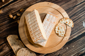 A big block of cheese that everyone likes to eat.