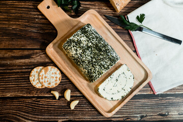 A big block of cheese that everyone likes to eat.