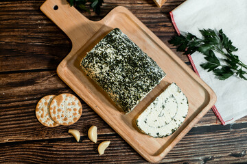 A big block of cheese that everyone likes to eat.