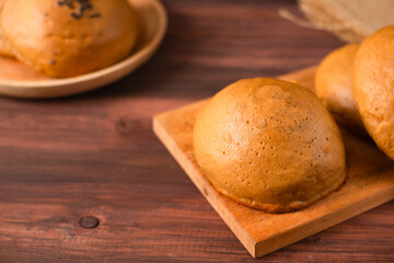 Mexican coffee bun. It is sweet bun with coffee topping and butter as filling