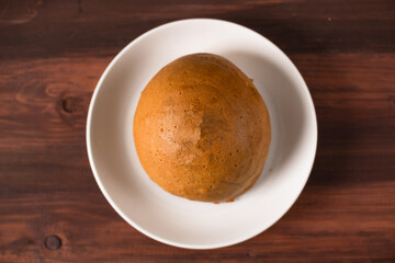 Mexican coffee bun. It is sweet bun with coffee topping and butter as filling