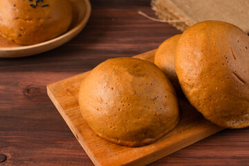 Mexican coffee bun. It is sweet bun with coffee topping and butter as filling