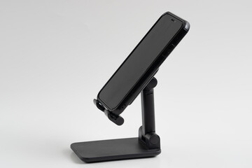 Phone holder stand that can be adjusted to height angle isolated on white background. holder for phone, phone stand, mount, universal