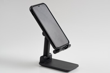 Phone holder stand that can be adjusted to height angle isolated on white background. holder for phone, phone stand, mount, universal