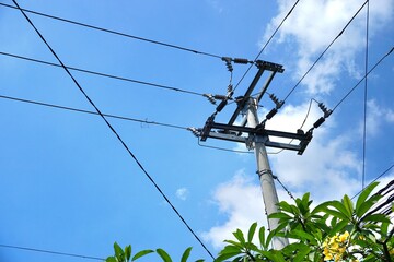 power pole over blue sky